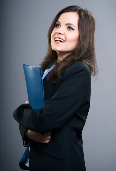 Attractive young woman in a black jacket. Woman holds a blue fol — Stock Photo, Image