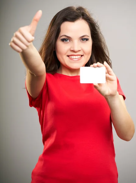 Uma jovem atraente com uma camisa vermelha. Mulher segura um cartaz e — Fotografia de Stock