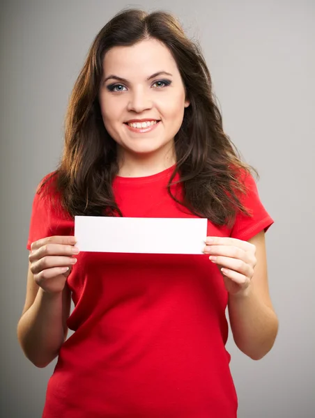 Portrait of young woman in a red shirt. Woman holds a poster. — Stock Photo, Image