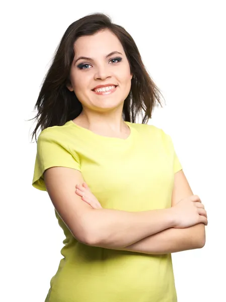 Attraktive junge Frau im gelben Hemd. Frau steht mit Fo — Stockfoto