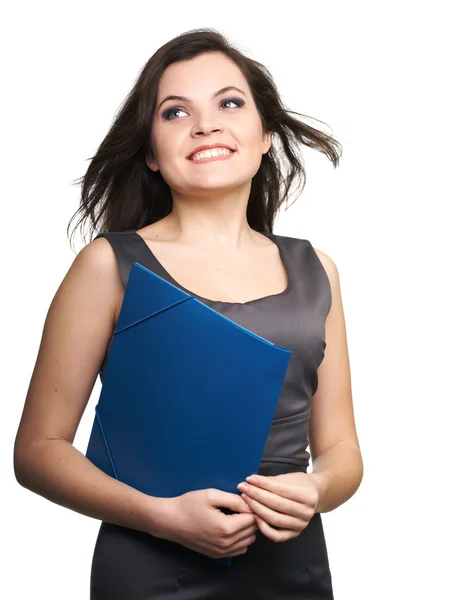 Attractive young woman in a gray business dress. Woman holds a b — Stock Photo, Image