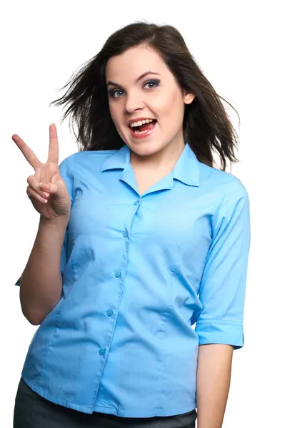 Jolie jeune femme en chemise bleue. Femme montre un symbole de — Photo