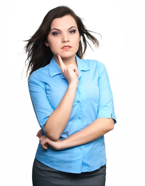 Una joven atractiva con una camisa azul. Mujer sostiene su dedo o — Foto de Stock