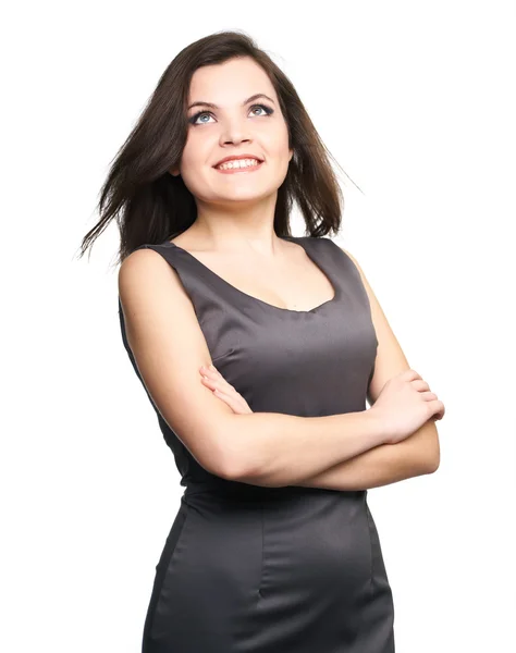 Attraktiv ung kvinna i en grå business klänning. — Stockfoto