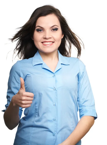 Una joven atractiva con una blusa azul. Mujer mostrando pulgares hacia arriba —  Fotos de Stock