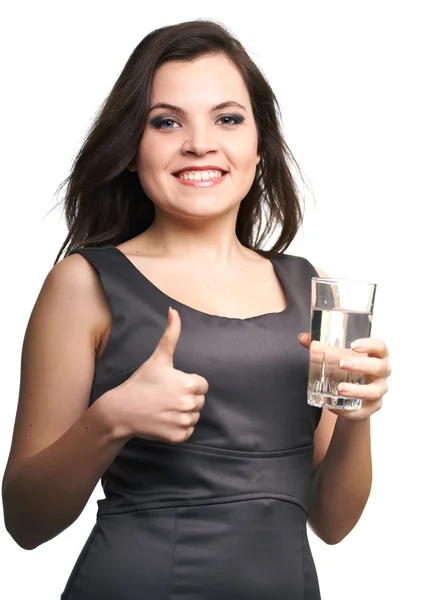 Attractive young woman in a gray business dress. Woman holding a — Stock Photo, Image