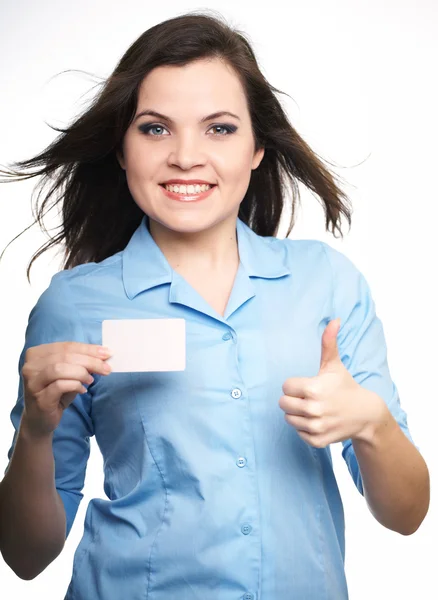 Attractive young woman in a blue shirt. Woman holds a poster and — Stock Photo, Image