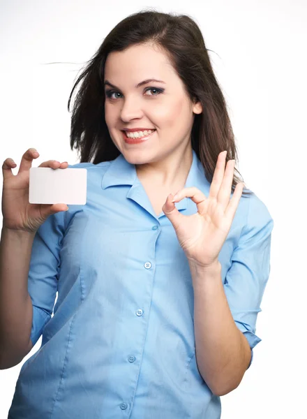 Uma jovem atraente com uma camisa azul. Mulher segura um cartaz e — Fotografia de Stock