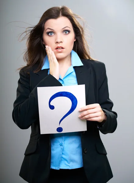 Surprised young woman in a black jacket. Woman holds a poster wi — Stock Photo, Image