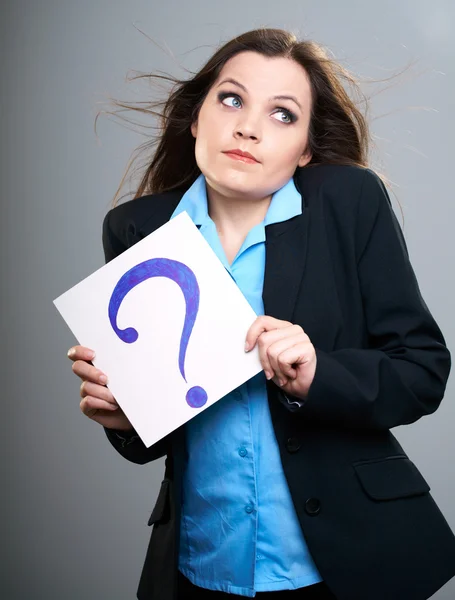 Attractive young woman in a black jacket. Woman holds a poster w — Stock Photo, Image