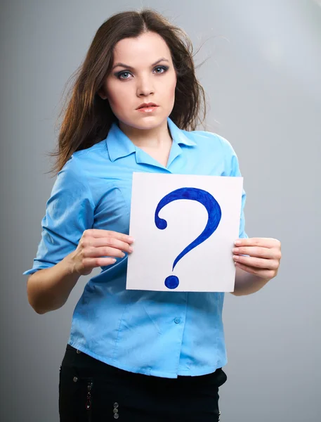 Attractive young woman in a blue shirt. Woman holds a poster wit — Stock Photo, Image