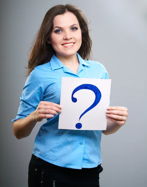 Aantrekkelijke jonge vrouw in een blauw shirt. vrouw houdt een poster wit — Stockfoto
