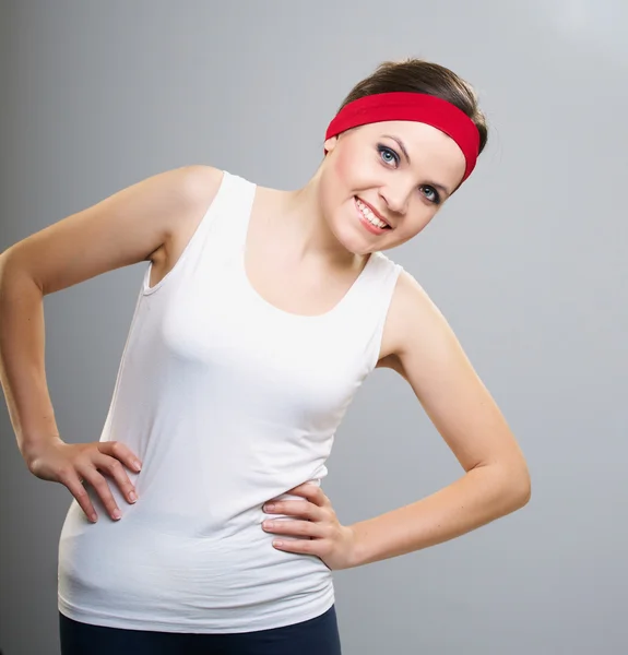 Attraktiv ung kvinna i sportkläder. kvinna i fitness. — Stockfoto