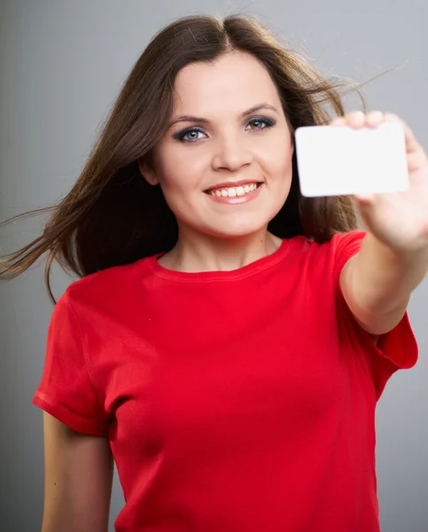 Una joven atractiva con una camisa roja. Mujer sostiene un cartel . —  Fotos de Stock