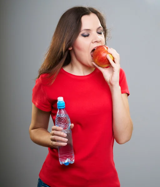 Aantrekkelijke jonge vrouw in een geruite jurk. — Stockfoto