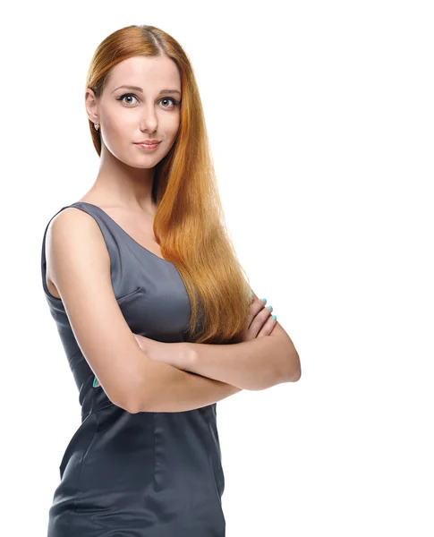 Aantrekkelijke jonge vrouw in een grijze zakelijke jurk. permanent met f — Stockfoto