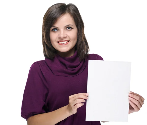 Attractive young woman in a red dress. Holds a poster. — Stock Photo, Image