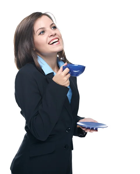 Attractive young woman in a black jacket. Holds a blue cup and s — Stock Photo, Image