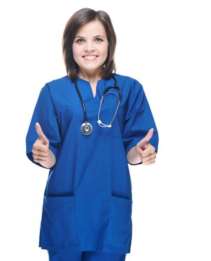 çekici genç hemşire üniforması. başparmak ile her iki h göstermek yukarıya