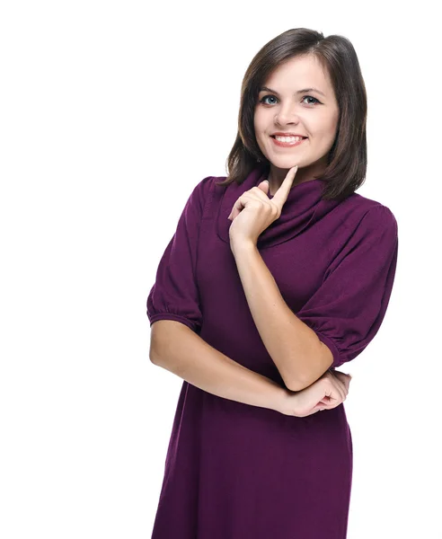 Attractive young woman in a red dress. Holding her finger on her — Stock Photo, Image