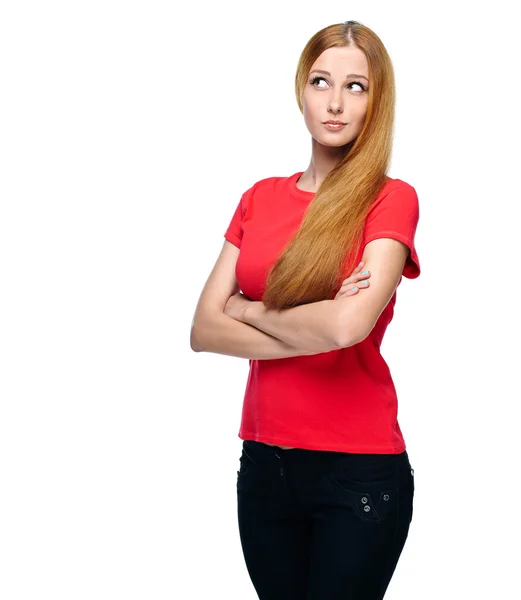 Aantrekkelijke jonge vrouw in een blauw shirt en spijkerbroek. staande — Stockfoto