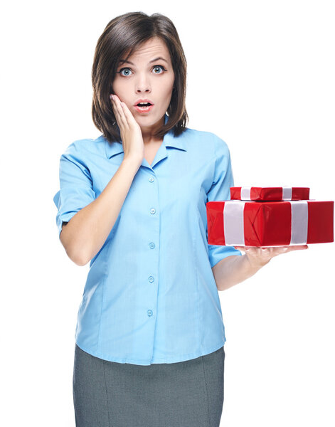 Surprised young woman in a blue blouse. Holds a gift box.