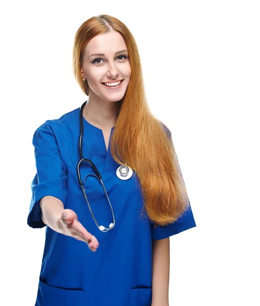 Jovem enfermeira atraente de uniforme. Dar uma mão por um aperto de mão — Fotografia de Stock