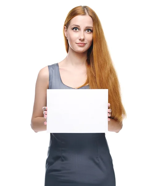 Aantrekkelijke jonge vrouw in een grijze zakelijke jurk. houdt een poster. — Stockfoto