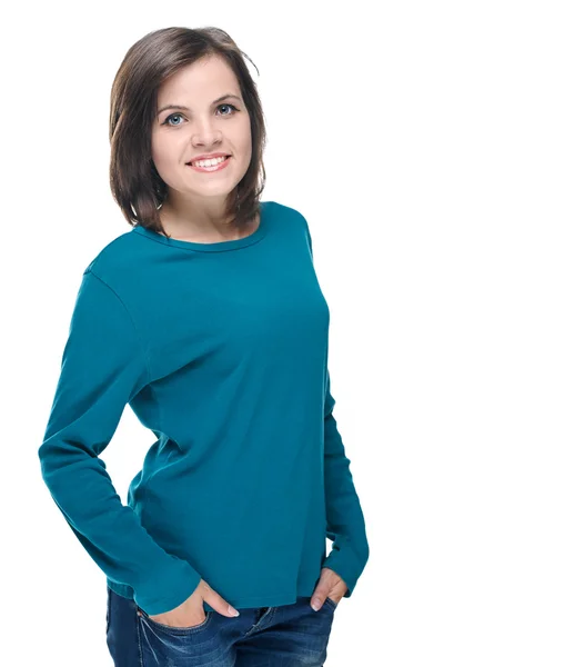 Aantrekkelijke jonge vrouw in een blauw shirt en spijkerbroek. geïsoleerd op wh — Stockfoto