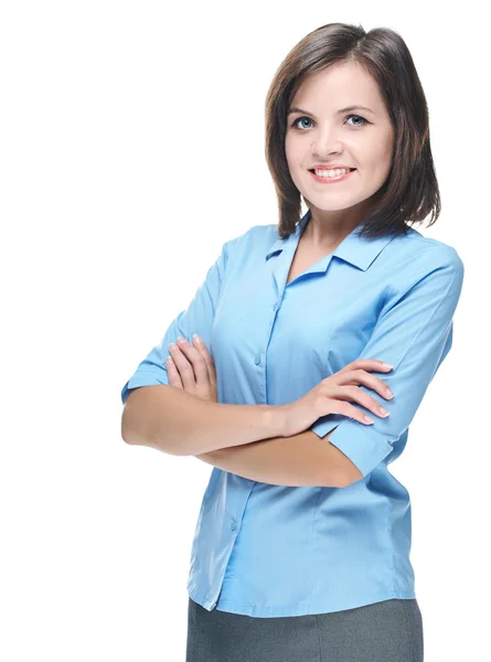Ελκυστική νεαρή γυναίκα σε ένα μπλε μπλούζα. στέκεται με διπλωμένο χα — Φωτογραφία Αρχείου