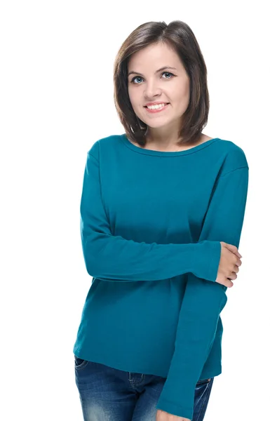 Attractive young woman in a blue shirt and jeans. Isolated on wh — Stock Photo, Image