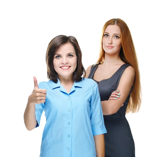 Duas meninas atraentes em roupas de negócios. Mostrando polegares para cima . — Fotografia de Stock