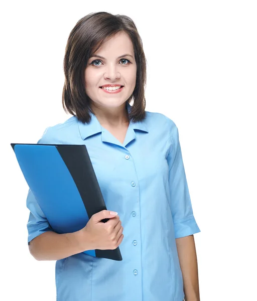 Uma jovem atraente de blusa azul. Mantém uma pasta . — Fotografia de Stock