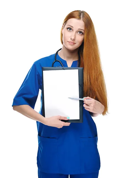 Attractive young nurse with a stethoscope. Holds poster and poin — Stock Photo, Image