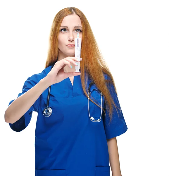 Attractive young nurse in uniform. Holds syringe. Isolated on wh — Stock Photo, Image