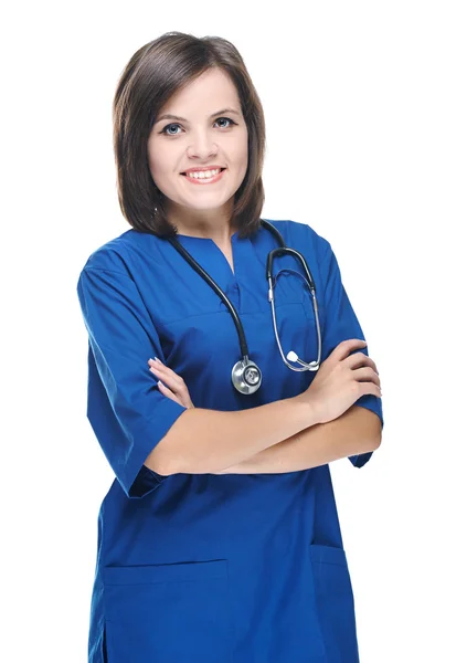 Aantrekkelijke jonge verpleegster met een stethoscoop. staande met gevouwen — Stockfoto