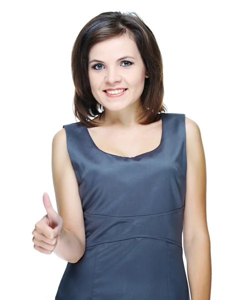 Atraktivní mladá žena v šatech šedé podnikání. Zobrazeno palce — Stock fotografie