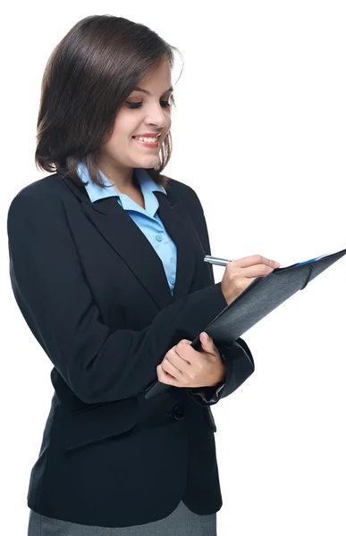 Attractive young woman in a black business suit. Holds a folder Royalty Free Stock Images