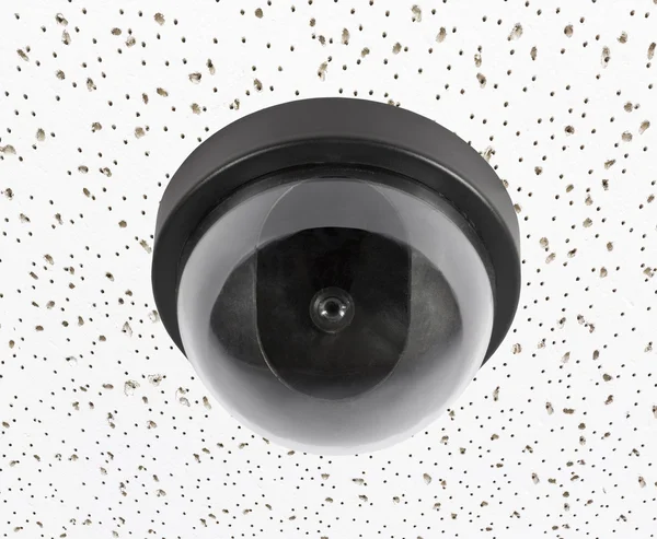 Macchina fotografica di sicurezza sul soffitto delle mattonelle acustiche — Foto Stock