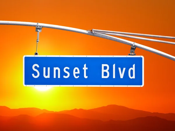 Sunset Blvd Sign con cielo naranja al atardecer —  Fotos de Stock