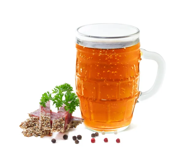 Mug of beer and salami with parsley on a white background — Stock Photo, Image