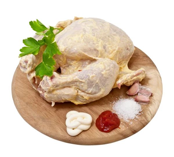 Raw chicken in the marinade on a white background — Stock Photo, Image