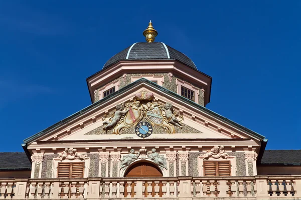 Fragment of the facade of a historic building with a clock — Stock Photo, Image