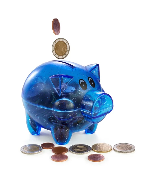 Piggy bank with coins on a white background — Stock Photo, Image