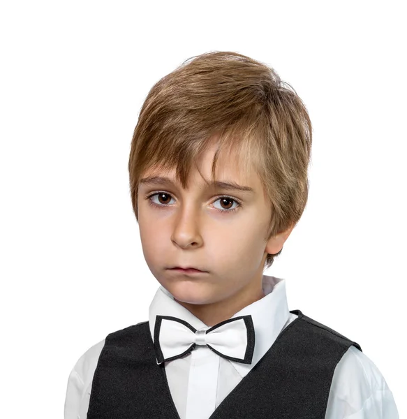 Retrato de un niño con chaqueta y pajarita . — Foto de Stock