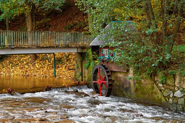 Decorative water mill in the forest. — Stock Photo, Image
