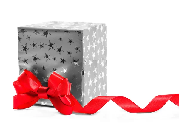 Gift with a red bow. Isolate on white background — Stock Photo, Image