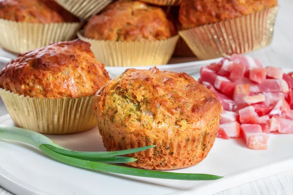 Muffins with cheese, bacon and herbs — Stock Photo, Image
