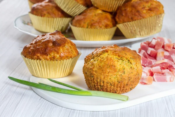 Muffins with cheese, bacon and herbs — Stock Photo, Image