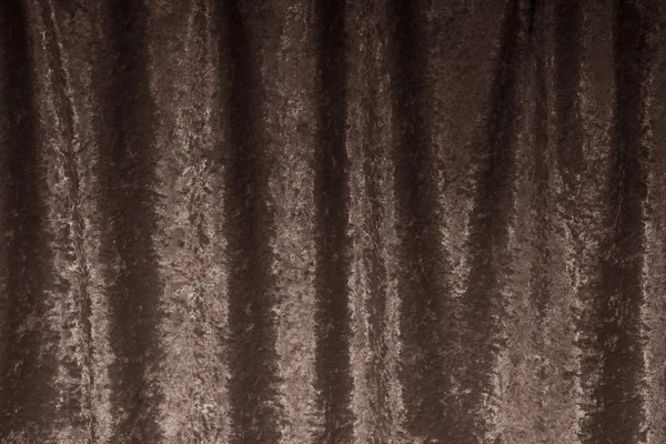 Abstracte textuur van een fluwelen gordijn. — Stockfoto